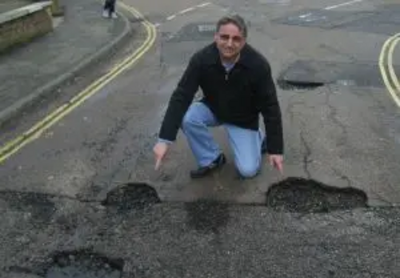 Cllr Douglas McCall Potholes